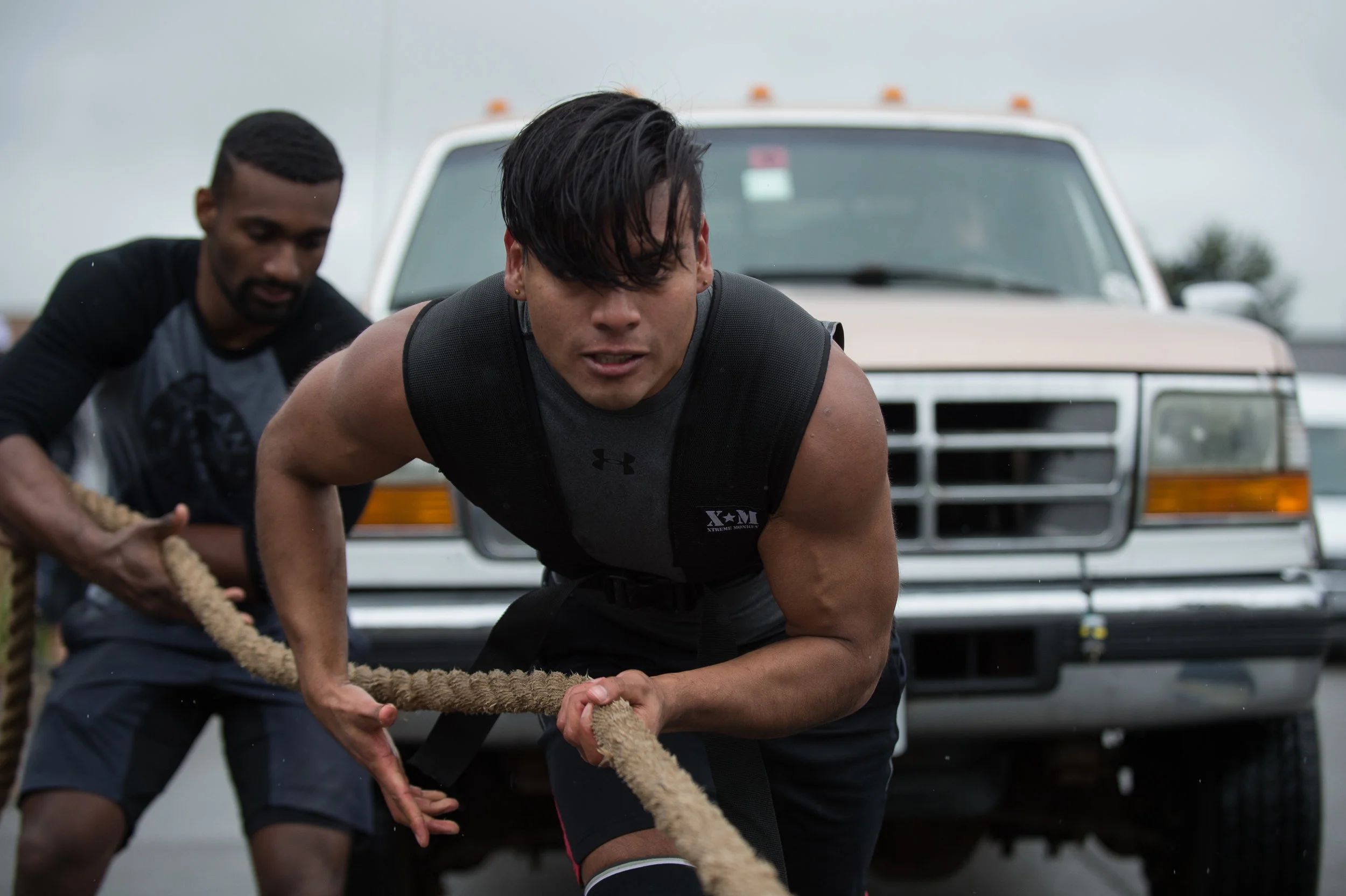 Ryan Ortiz, pulls a truck during the men's under 200 lbs category held by the RIT Weightlifters club, April 6, 2017, at Rochester Institute of Technology, in Henrietta N.Y. This was the tenth annual strong man competition during Rochester Institute of Technology's ImagineRIT Festival.