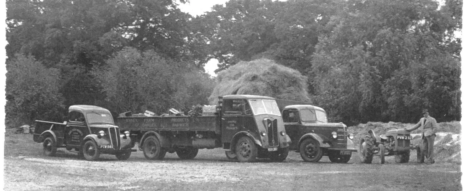George Thompson and his fleet of vehicles in the early 1950s.