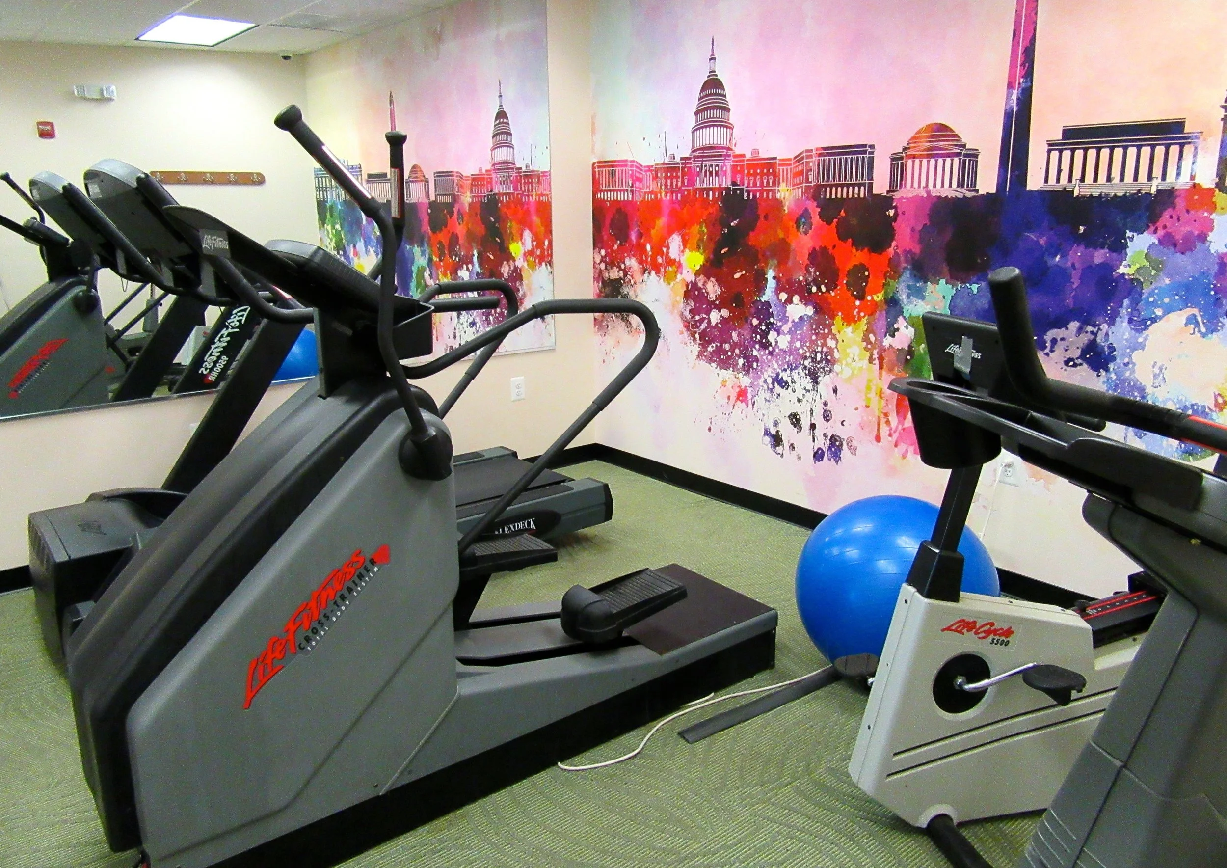 Treadmill, Elliptical, Stairmaster, and Stationary Bike in Cherry Hill Park's Gym