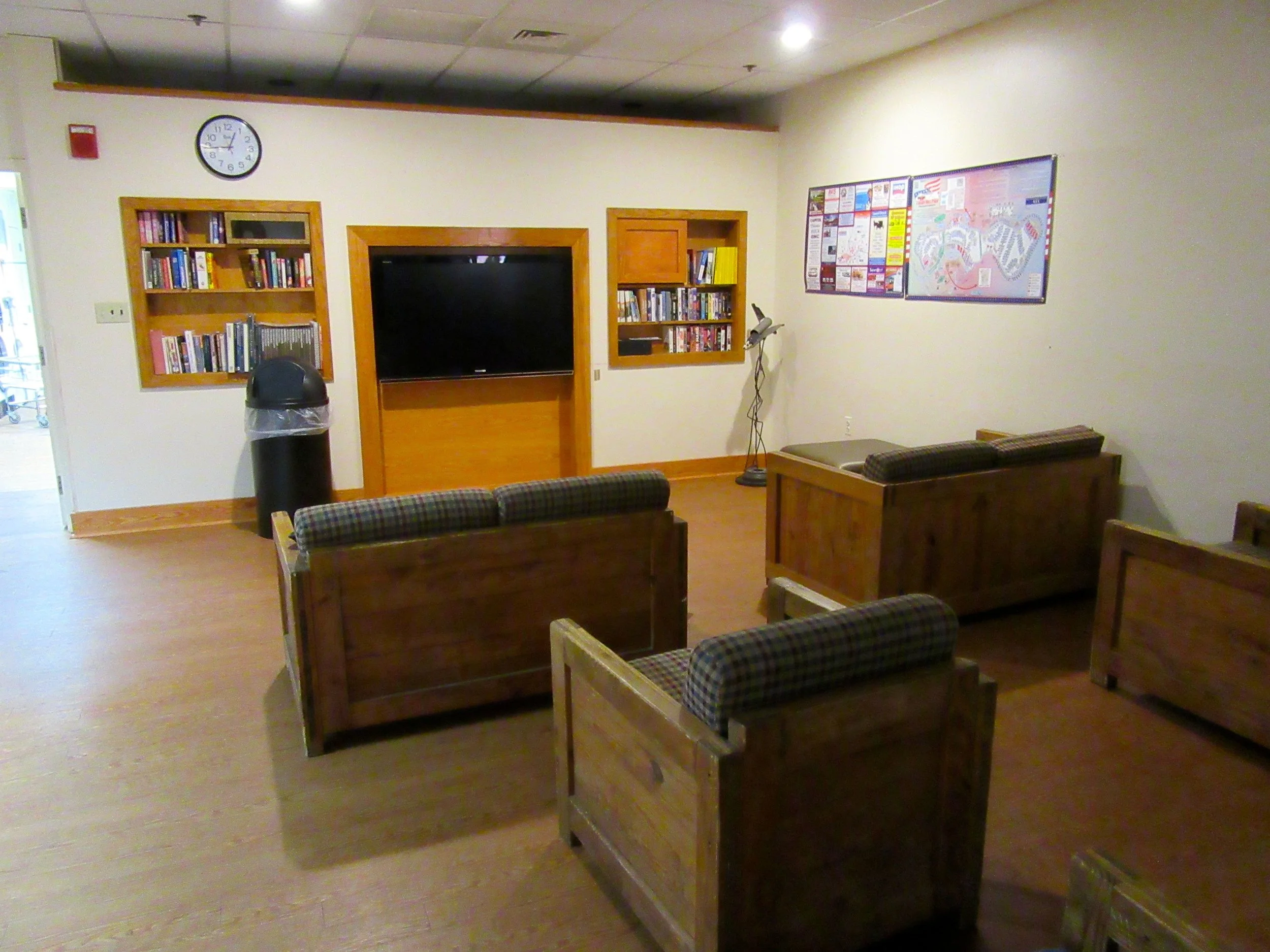 Rows of Sofas and Lounge Chairs Face the Television in Cherry Hill Park's TV Lounge