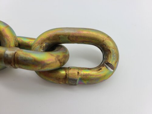 Nicked/Gouged Link - Properly use chain so that it isn’t damaged by utility equipment such as blades, buckets, or other sources. This chain needs to be removed from service. All associated hardware needs to be inspected.