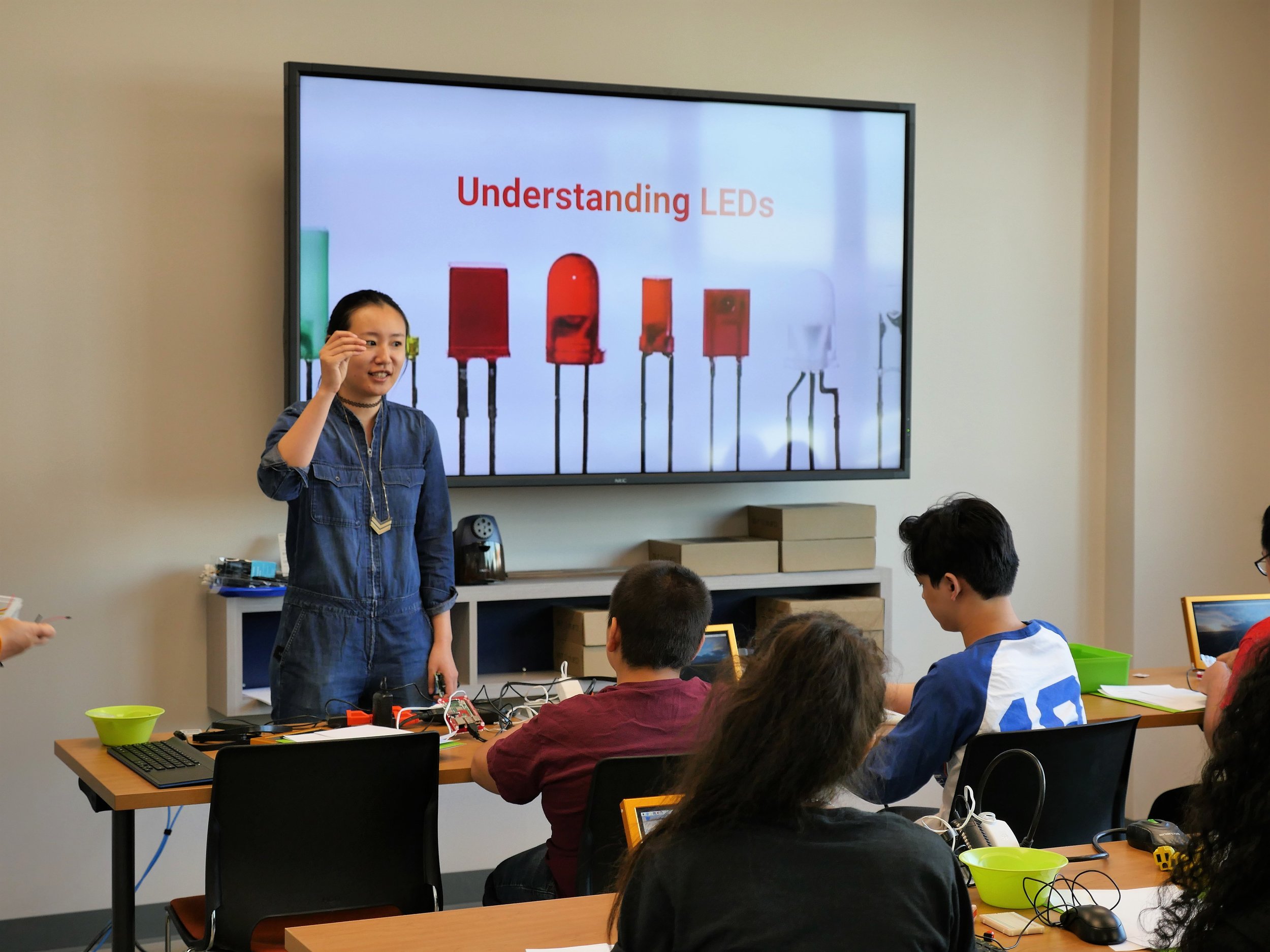 In Invent to Learn, Wanjun teaches students about recognizing and using different types of LEDS for physical computing. Courtesy of Amanda Shih . July 23rd, 2018.