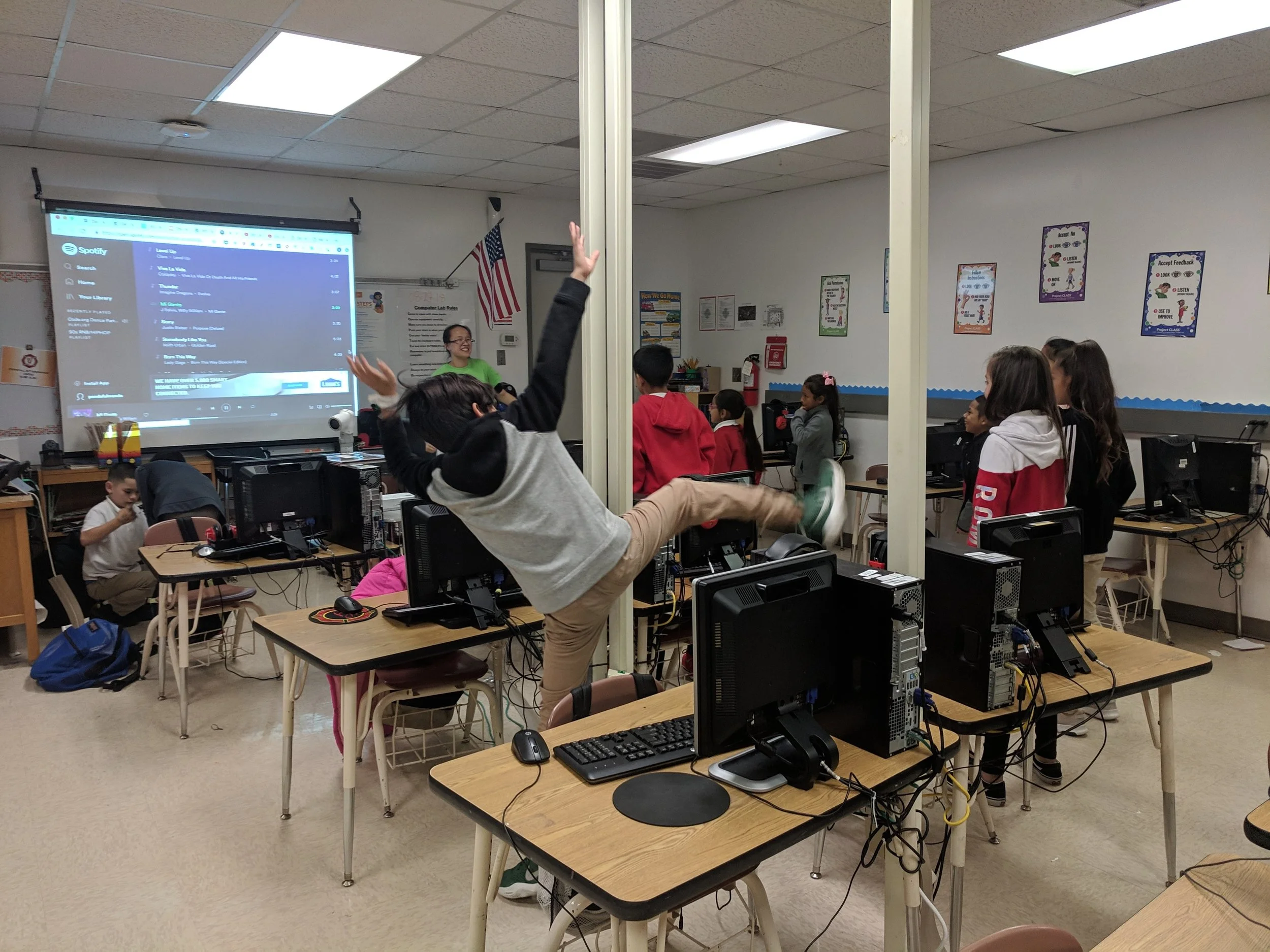 Students participated in the national CS Ed Tech week with Hour of Code Dance Party activity. They learned about events and coded characters in ways that surprised each other. Courtesy of Wanjun Zhang. December 4th, 2018.