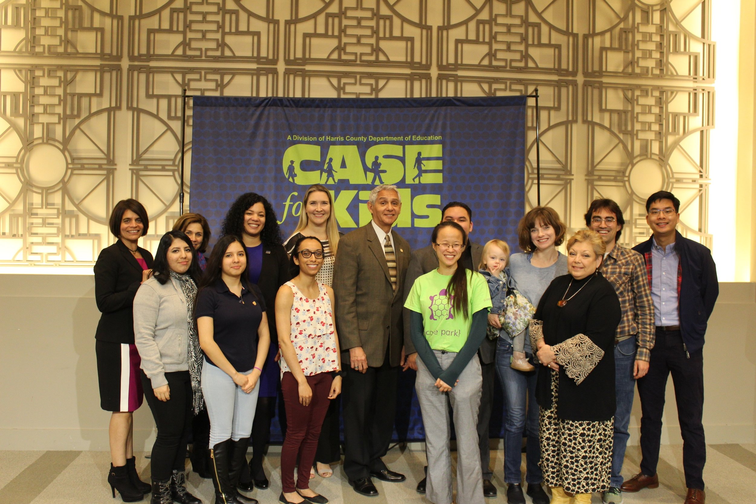 Code Park volunteers and other grant recipients pose with City Council Member Robert Gallegos at the City Connections photo shoot. Courtesy of HCDE. February 12th, 2019.