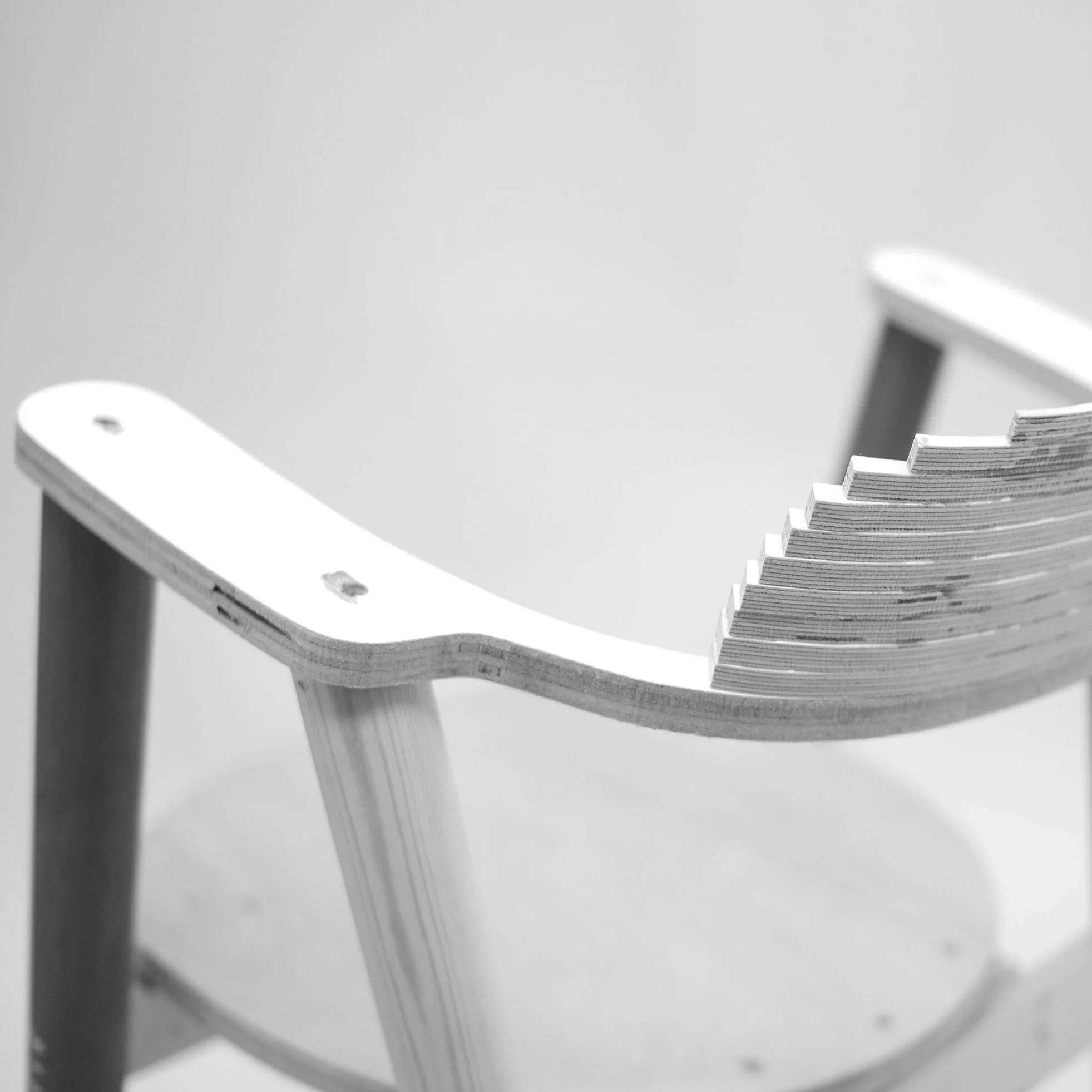  Details were quickly formed from abutments reasoned to be makeable and robust. The dining chair became broader and lower, low enough to match the dining table height, with an arm that slides neatly underneath. 