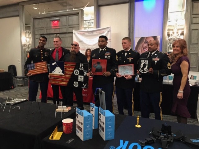 Perfectly Posh honored veterans at a special event before the 2019 Academy Awards with sponsor gift bags including Posh products and a product sampling bar.