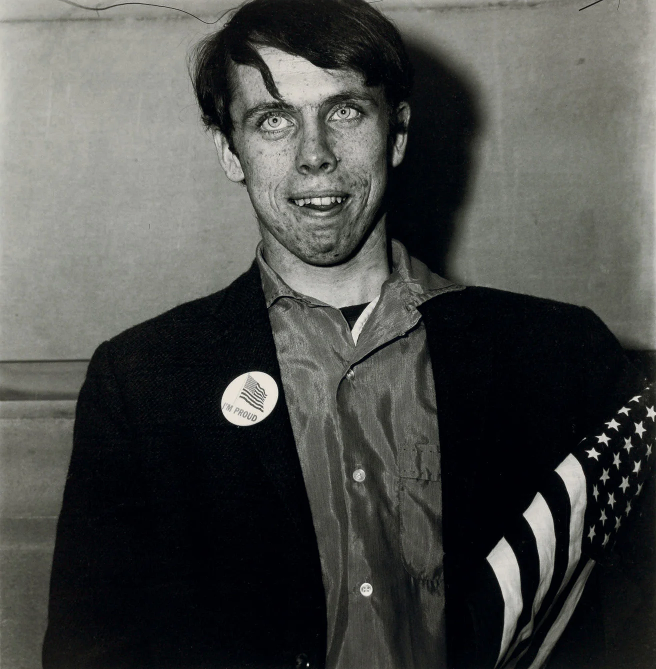 ©1968 estate of Diane Arbus, LLC, Patriotic Young Man with a Flag, N.Y.C. 1967 “What I’m trying to describe is that it’s impossible to get out of your skin into somebody else’s…. That somebody else’s tragedy is not the same as your own.” - Diane Arbus