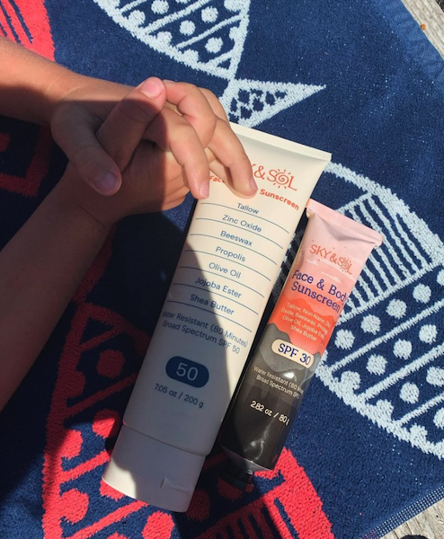 Sky and Sol tallow sunscreen SPF 30 and SPF 50 used outdoors showing non-toxic, family-safe sun protection for sensitive skin