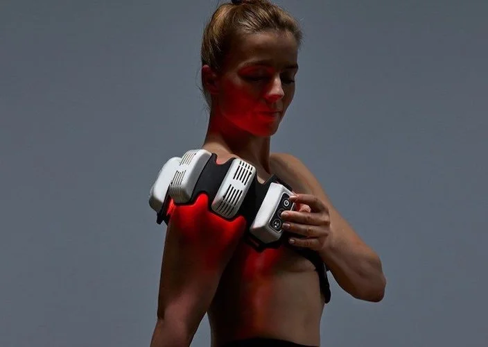 FlexBeam red light therapy device strapped over a shoulder