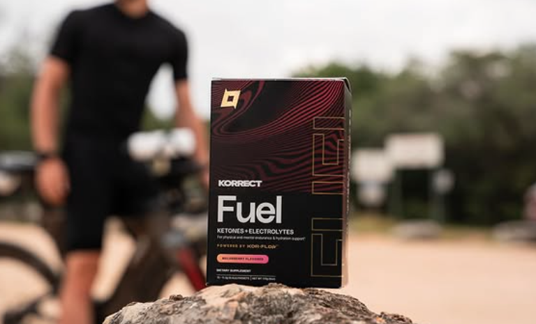 Korrect Fuel box on a rock during a cycling workout, representing the Korrect Life brand comparison