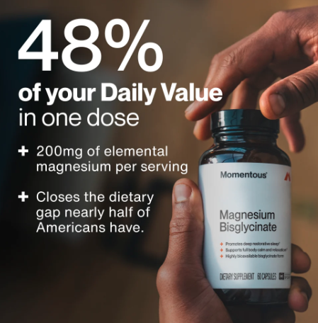 Momentous Magnesium Bisglycinate bottle in a nightly wind down setting