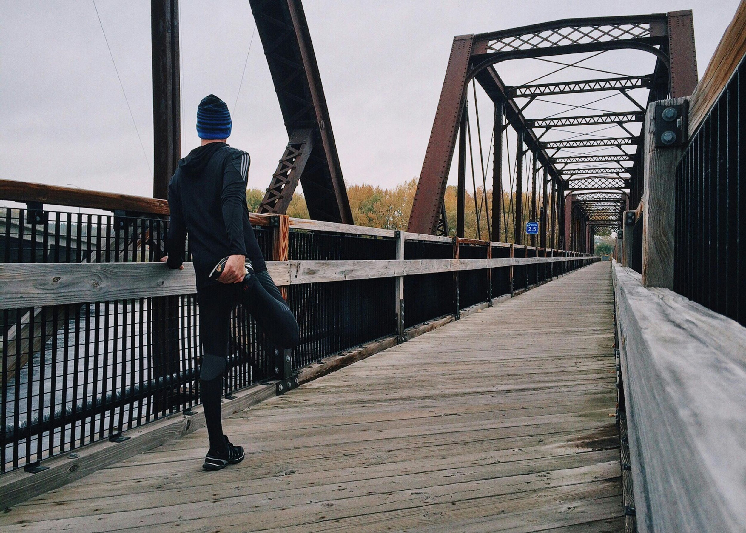 Person stretching outdoors before a workout