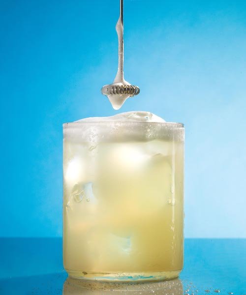 ARMRA colostrum mixed into a drink for gut health and immune support