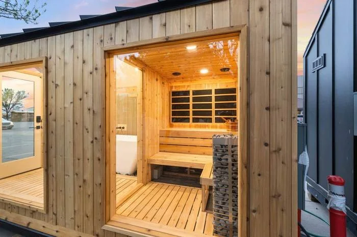 Sweaty Yeti sauna exterior cutaway showing the multi room layout