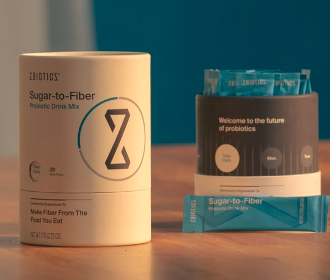ZBiotics Sugar-to-Fiber probiotic drink mix canister and sticks, representing the ZBiotics Sugar-to-Fiber Review