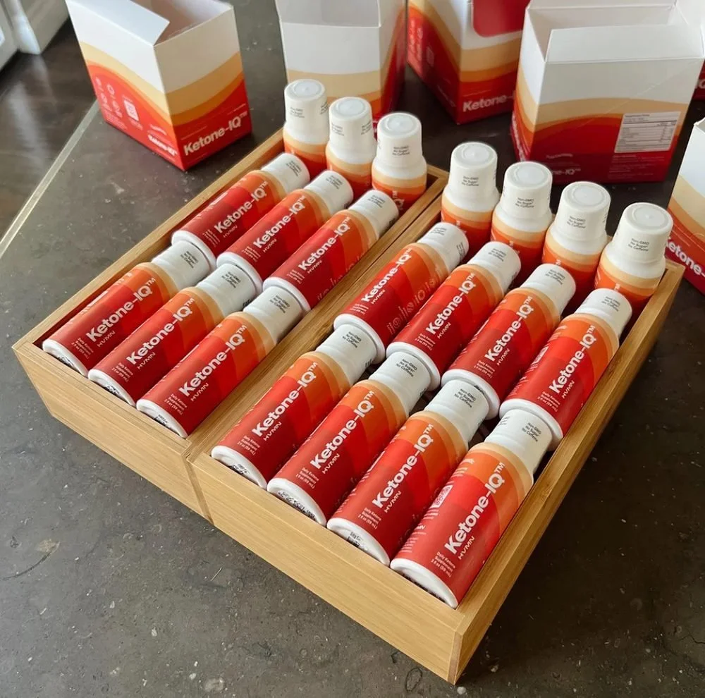 Open case of Ketone-IQ energy shot bottles