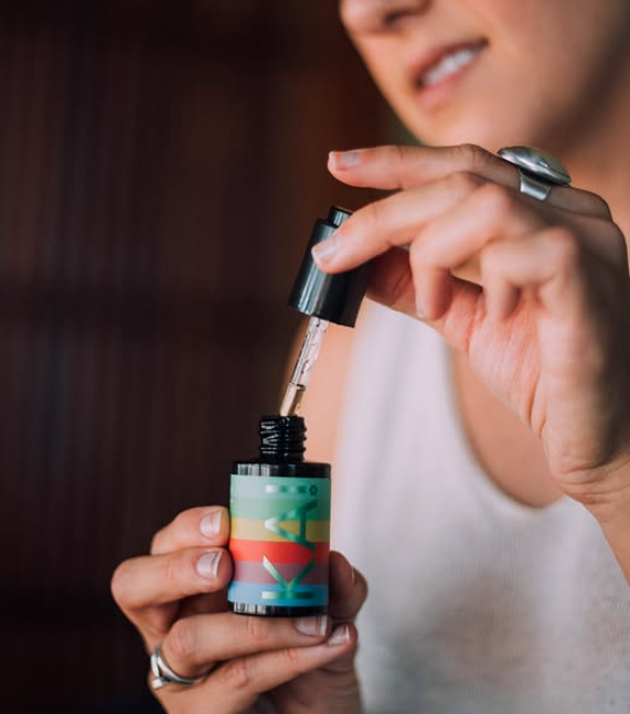 KA! Empathogenics kanna tincture bottle with dropper being used
