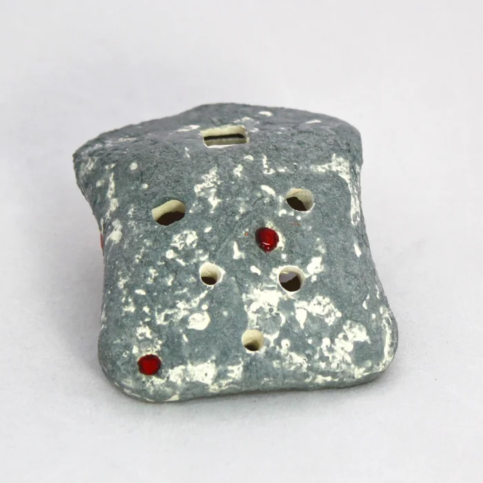 2.5" X 2" X 1"D Note the 6 round finger holes, 4 on top, 2 for thumbs underneath.