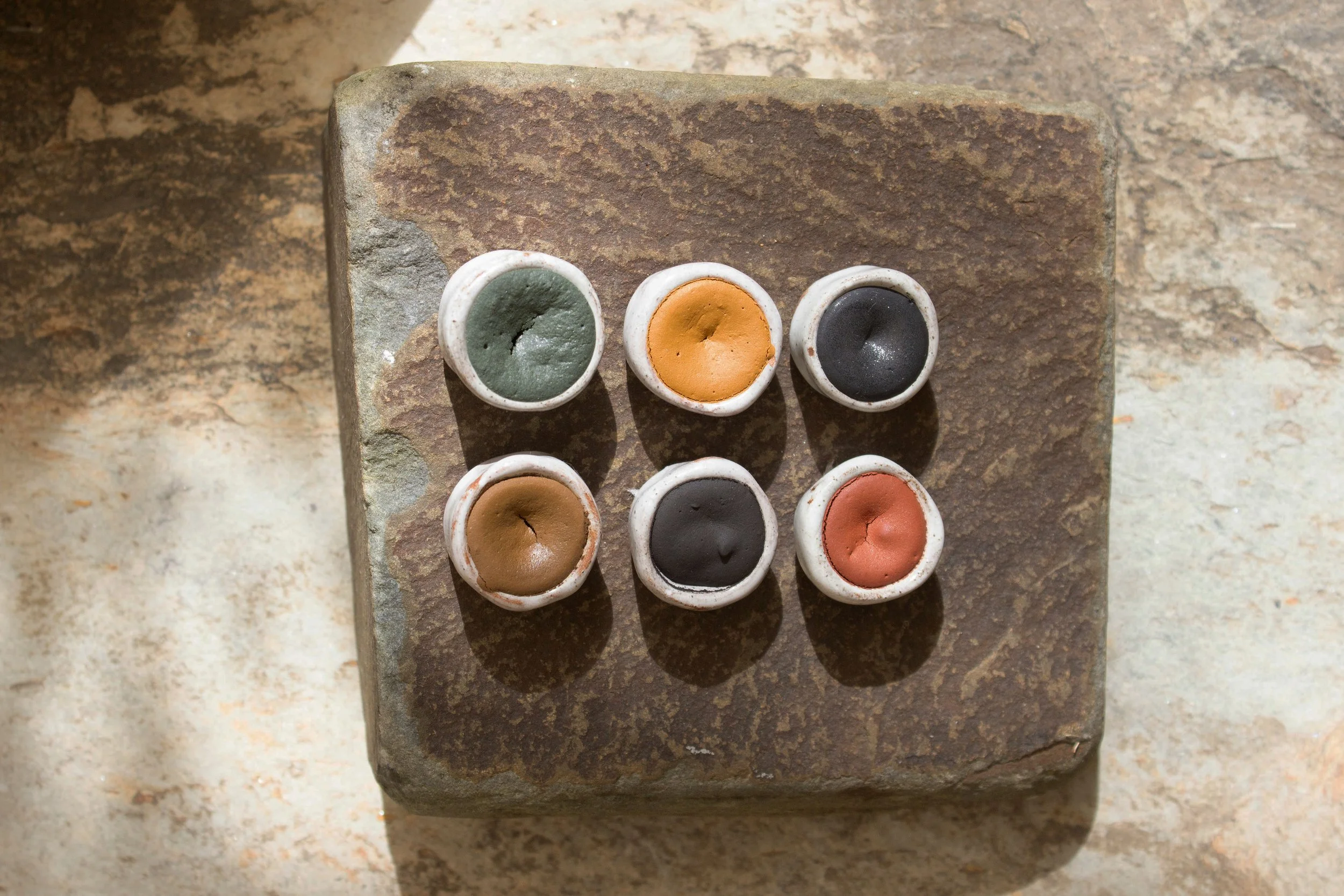 6 irregular Indian ceramic watercolour pans. earth colours