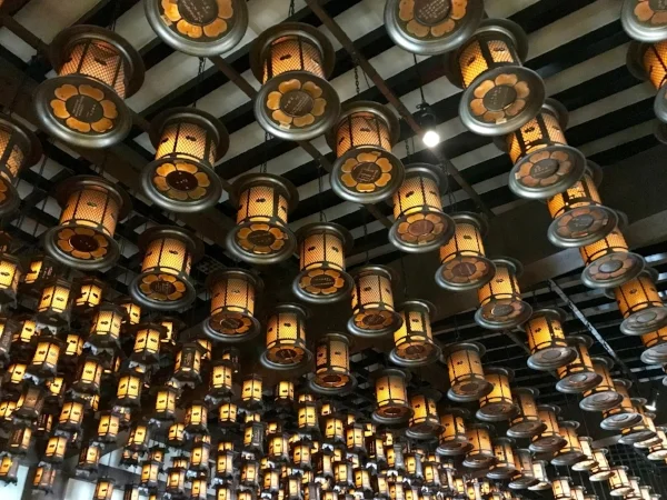 Lanterns hanging from the eaves of a temple in Nikko, Japan