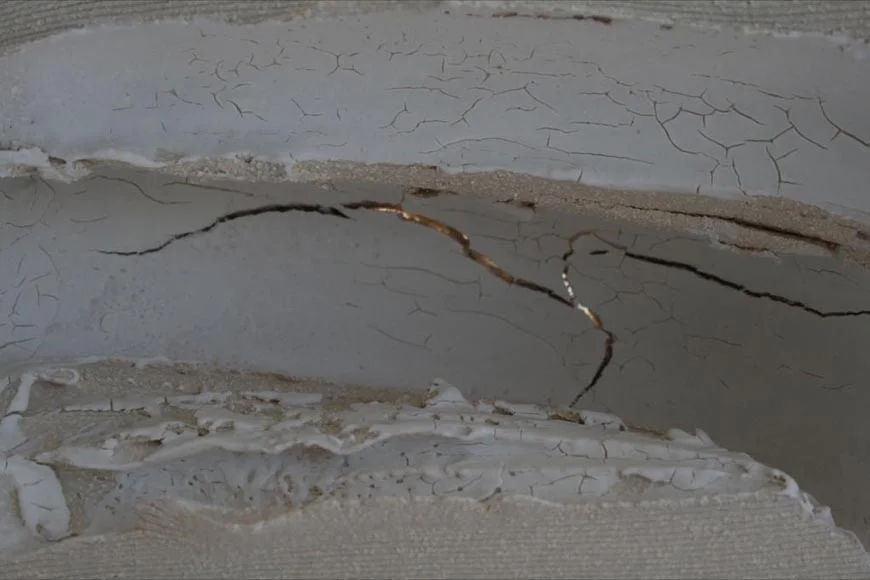 Front view with porcelain slip exploration into fluid mark making and enclosed spaces