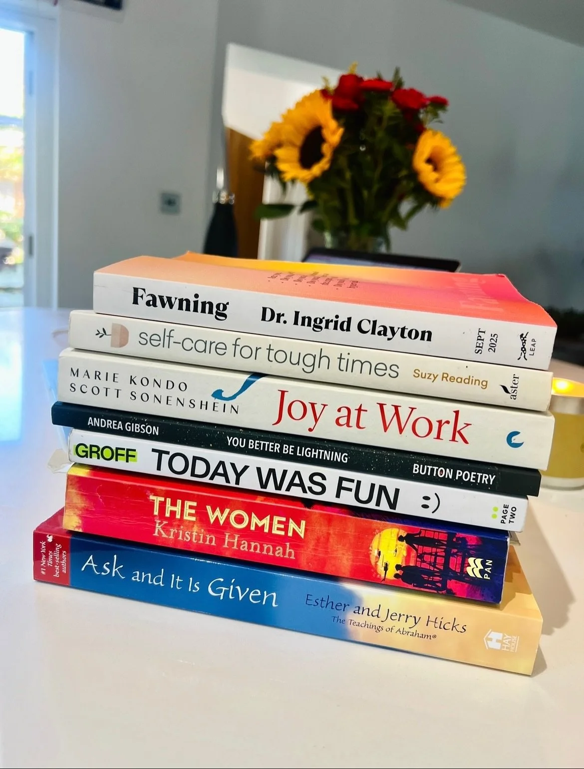 If we can tell a lot about somebody from their bookshelves, we can tell even *more* from their current bedside book stash.

Here&rsquo;s what&rsquo;s going on in my world right now - illustrated in book form (pictured from top to bottom) - a condense