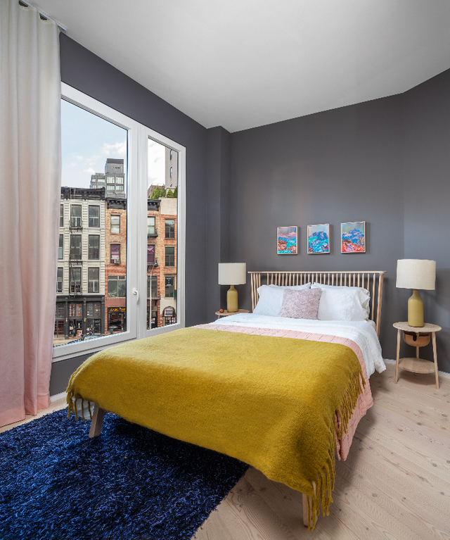 A bedroom furnished by The Future Perfect at 100 Franklin, in Tribeca
