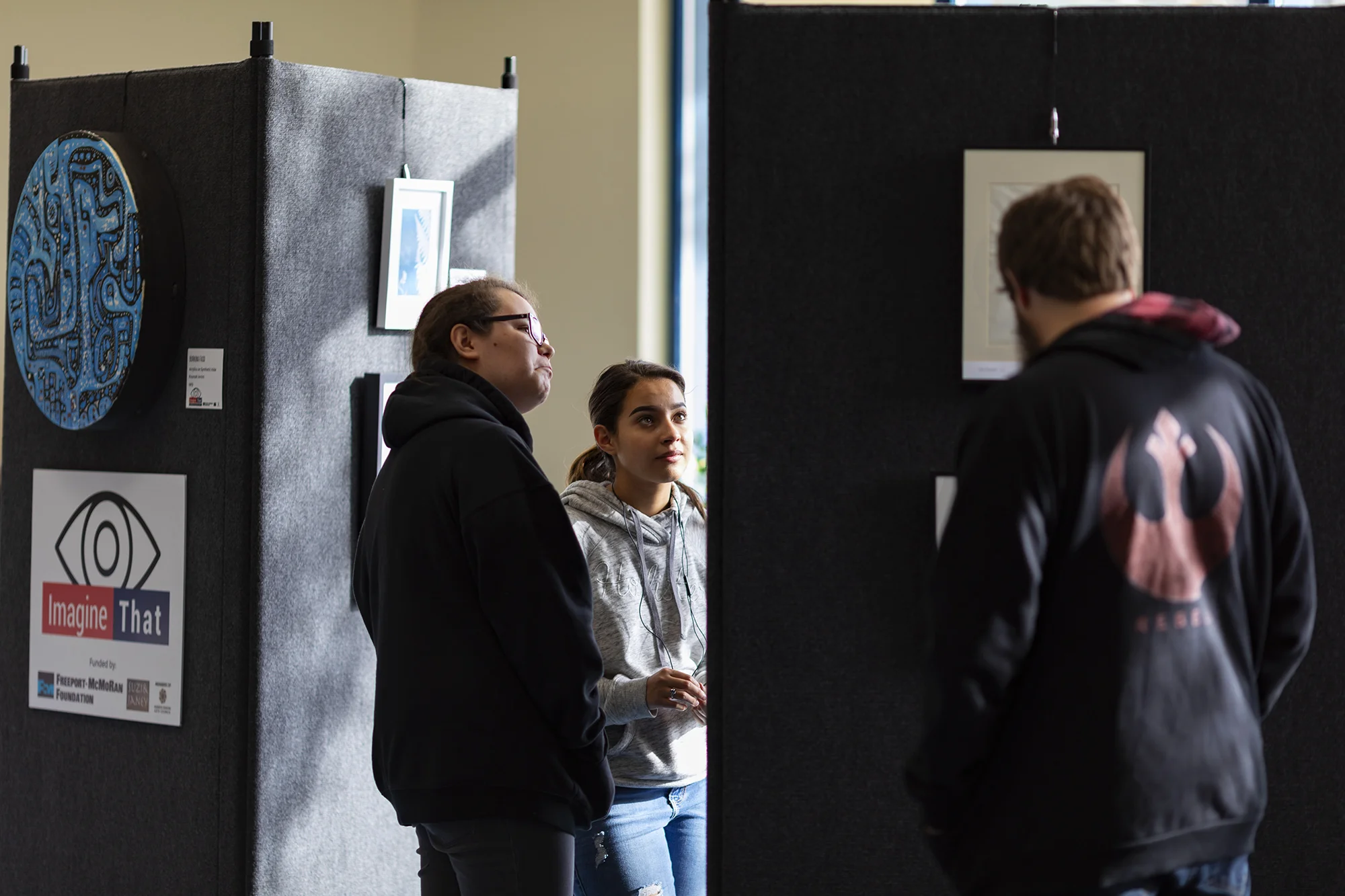 Students from Silver High School visiting the IMAGINE THAT! exhibition in the school’s library