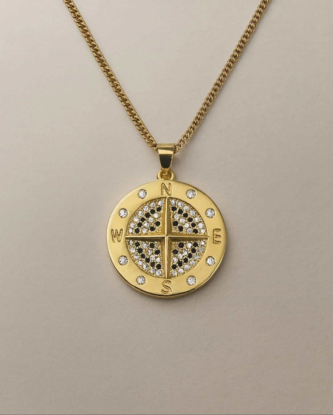 Timeless design meets modern versatility. The Compass Necklace has remains one of our most-wanted styles. A symbol of direction, grounding, and refined ease for both him and her.
 Whether layered or worn solo, it&rsquo;s a piece that moves with you w