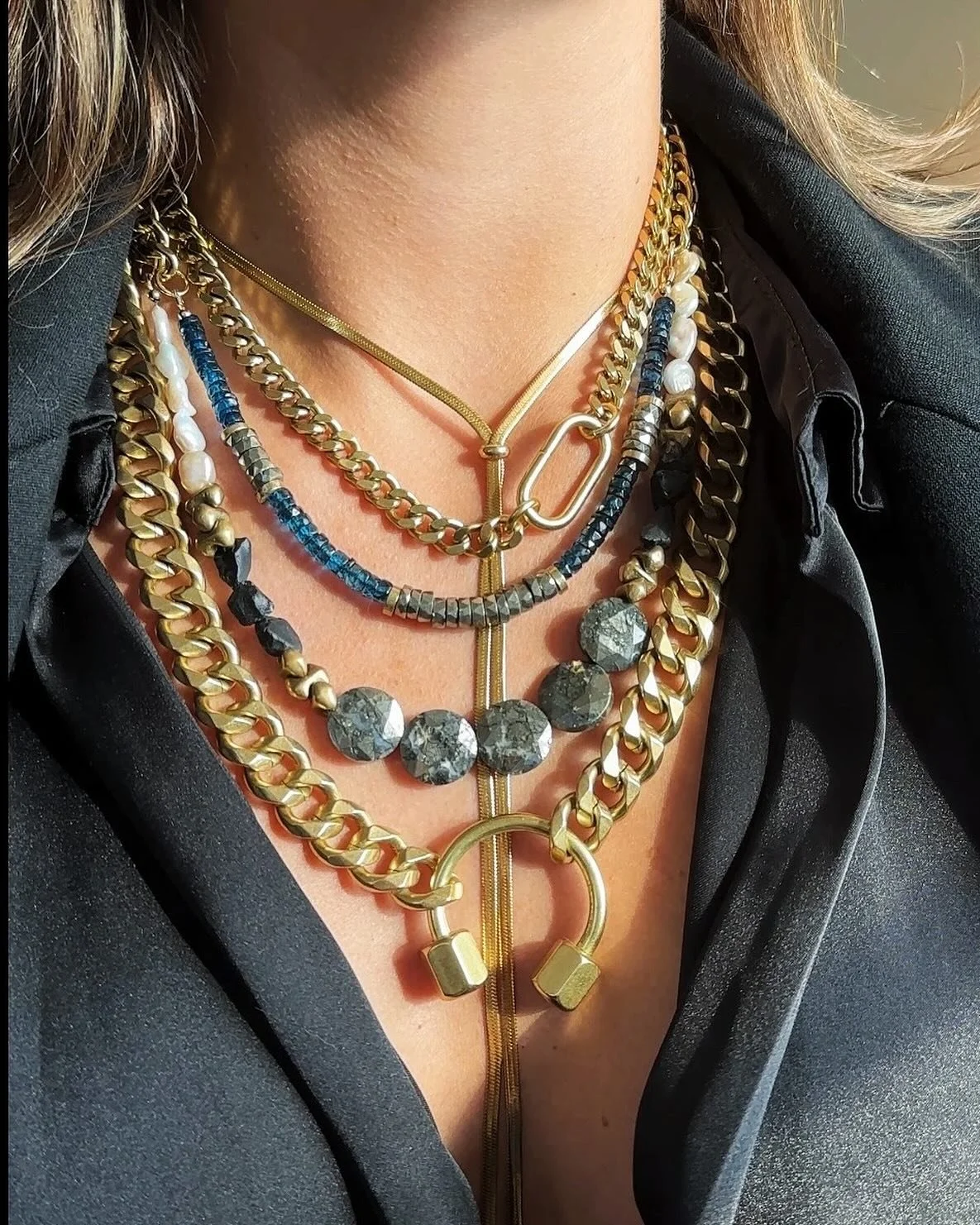Maximize bold elegance with the new Blue Topaz &amp; Pyrite Heishi and Nipomo Marcasite necklace.
 A reflection of winter&rsquo;s balance &mdash; refined yet expressive, designed for the moments that call for a little play and a lot of presence.

Dis