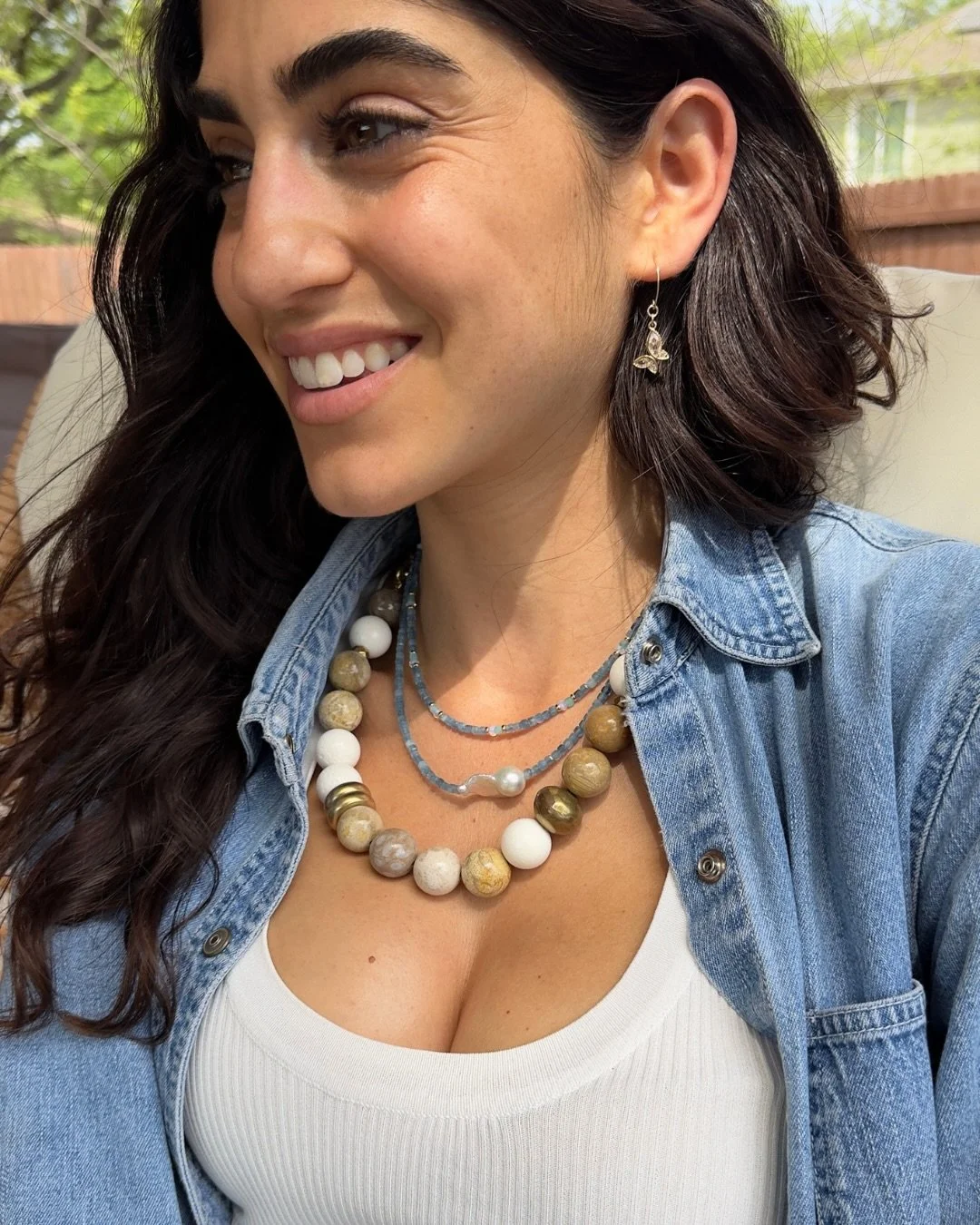 Not just your everyday beads.
Worn solo or stacked, these bigger beaded necklaces are an instant add-to-cart. 

WHITE SPONGE &amp; FOSSIL CORAL necklace features boho-luxe Indian brass beads and accents. Perfect for a button up and weekend getaway or