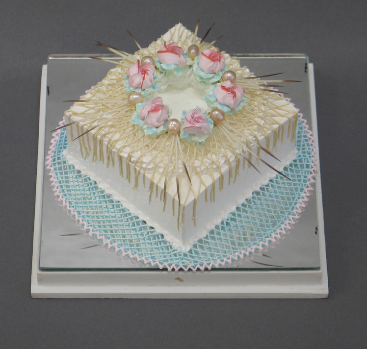 Acrylic square white cake with pink flowers on top