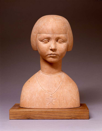 Statue of a terra cotta girl wearing a necklace