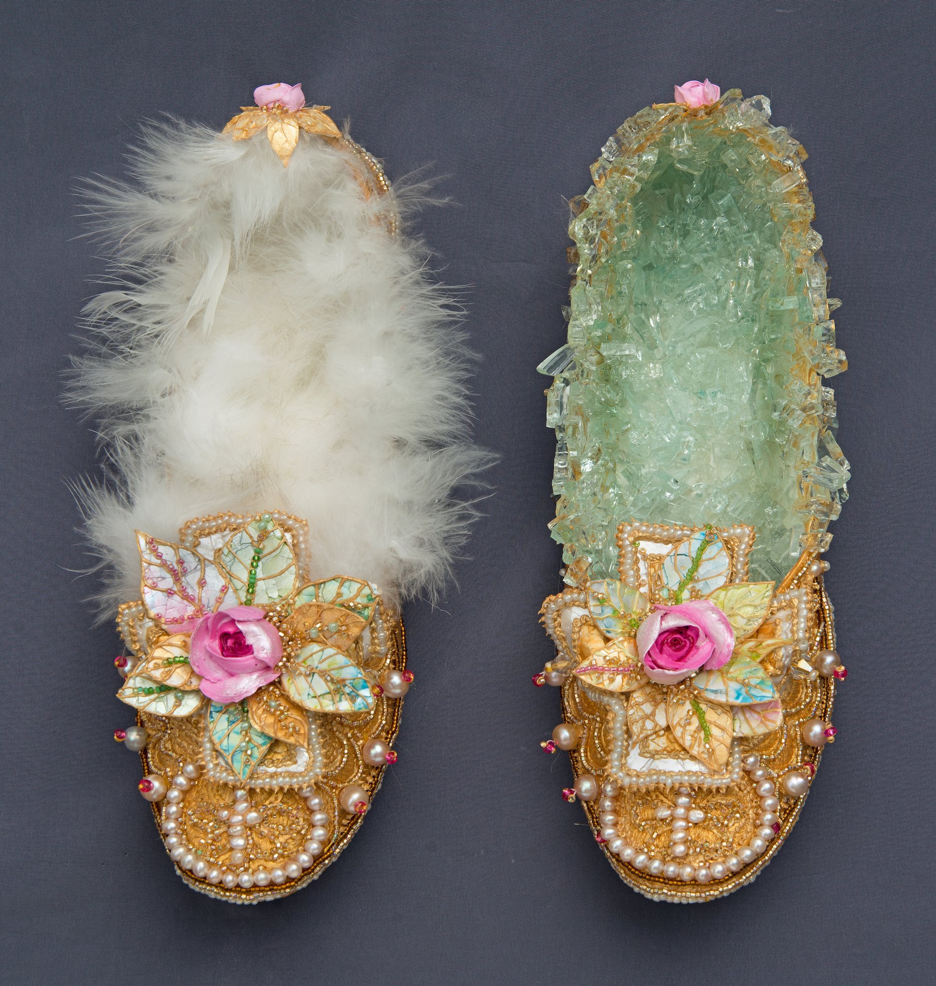 Gold shoes with pearls, roses, and leaves, one with a feather footbed and one with a footbed of glass shards.