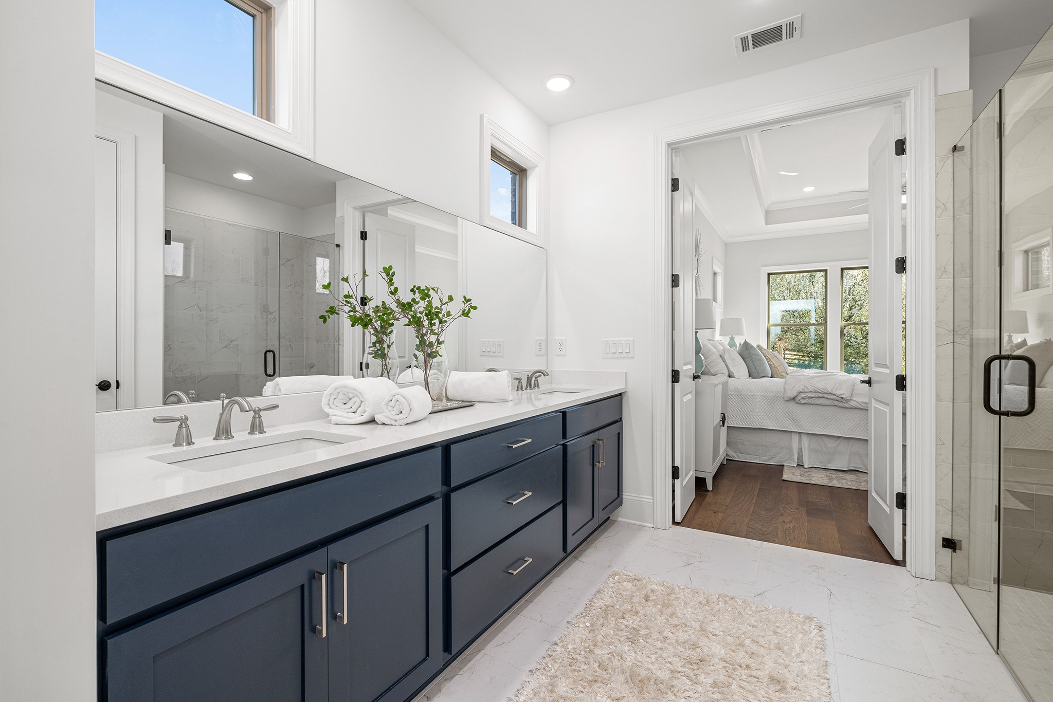 033-Primary Bath with Dual Vanity and Lots of Cabinets.jpg