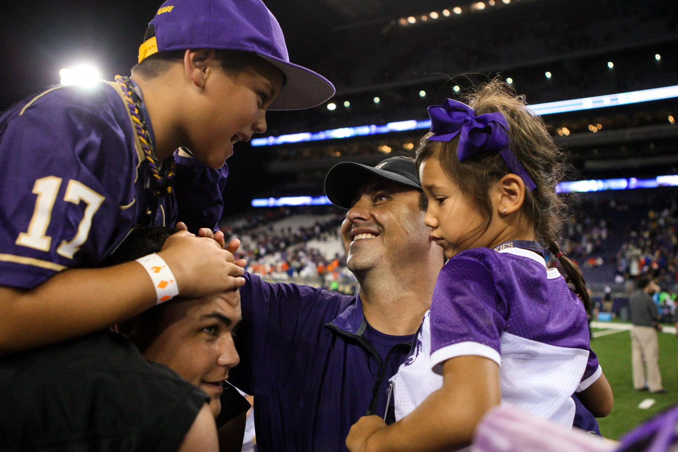 University+of+Washington+Huskies+Football+Head+Coach+Steve+Sarkisian+Celebrates+with+Kids.jpg