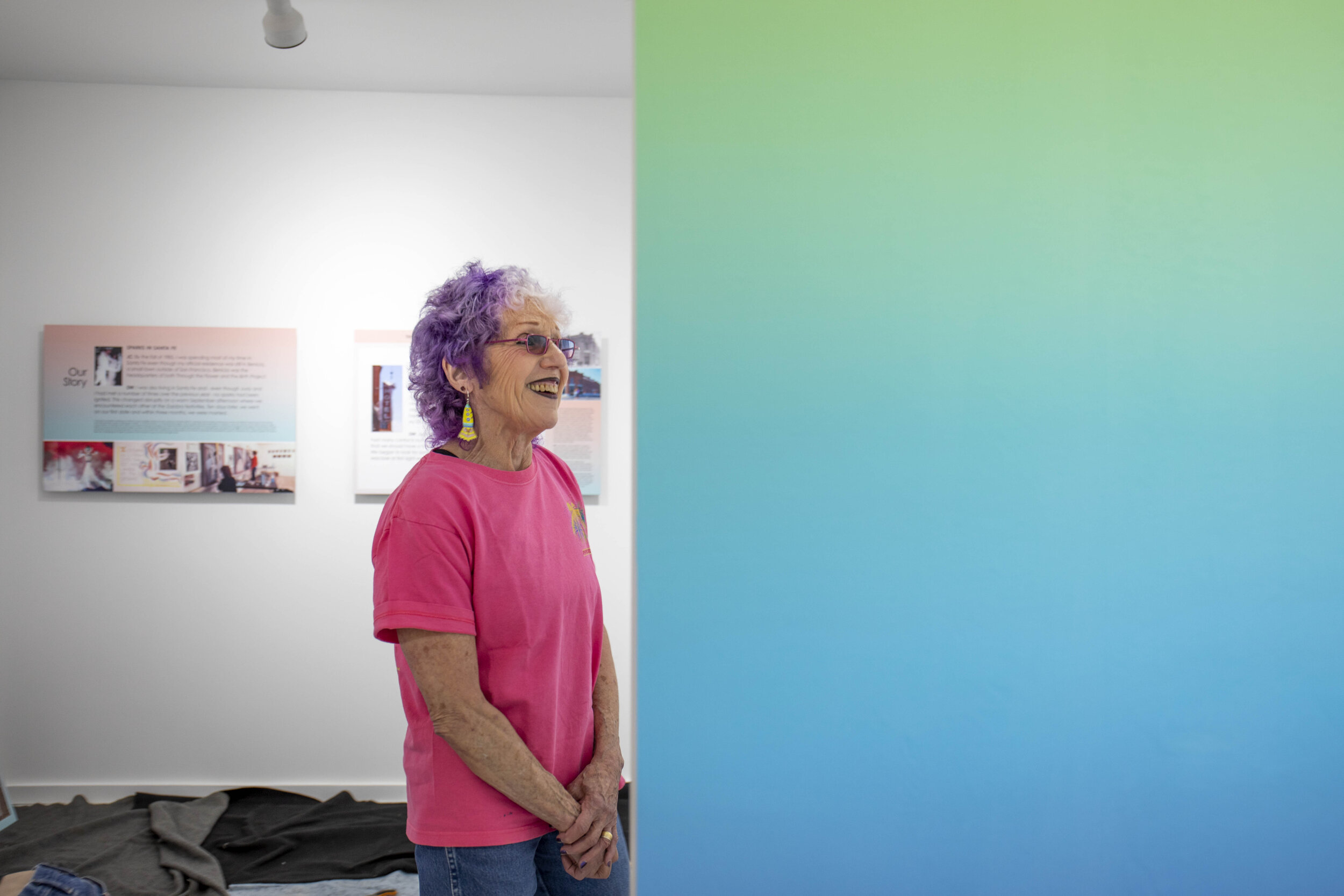  Judy Chicago at Through the Flower Art Space behind wallpaper she designed. The grand opening is set for July 20th through the 21st. The gallery of Chicago’s work has been at the center of controversy in the small town of Belen, N.M. due to differin