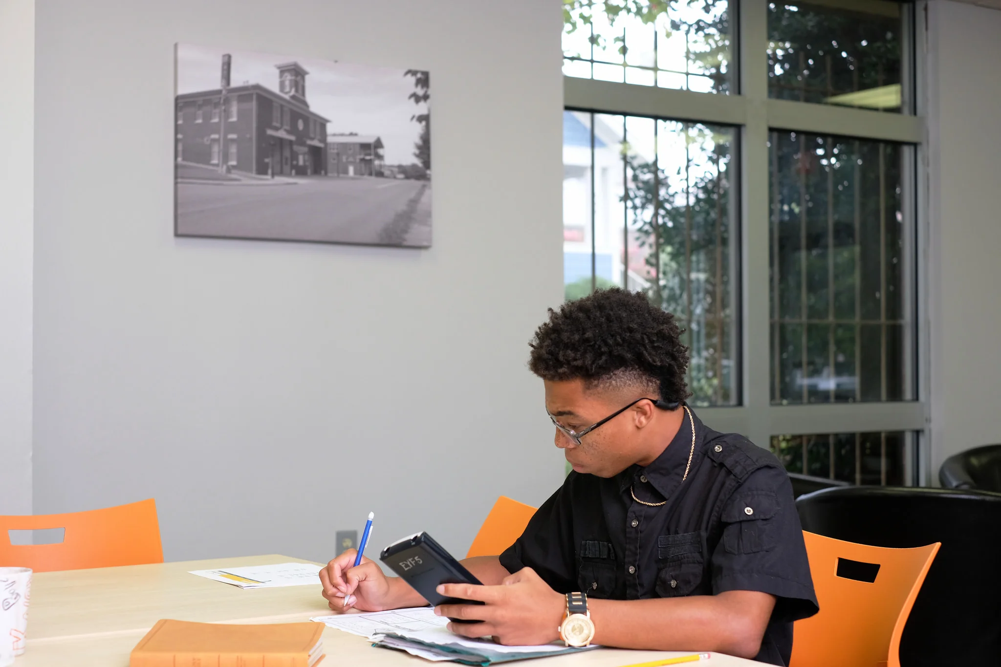 Austin-East High School student Javell Swanson works on his math assignment at Emerald Youth’s Calling & Career Ministry Center.