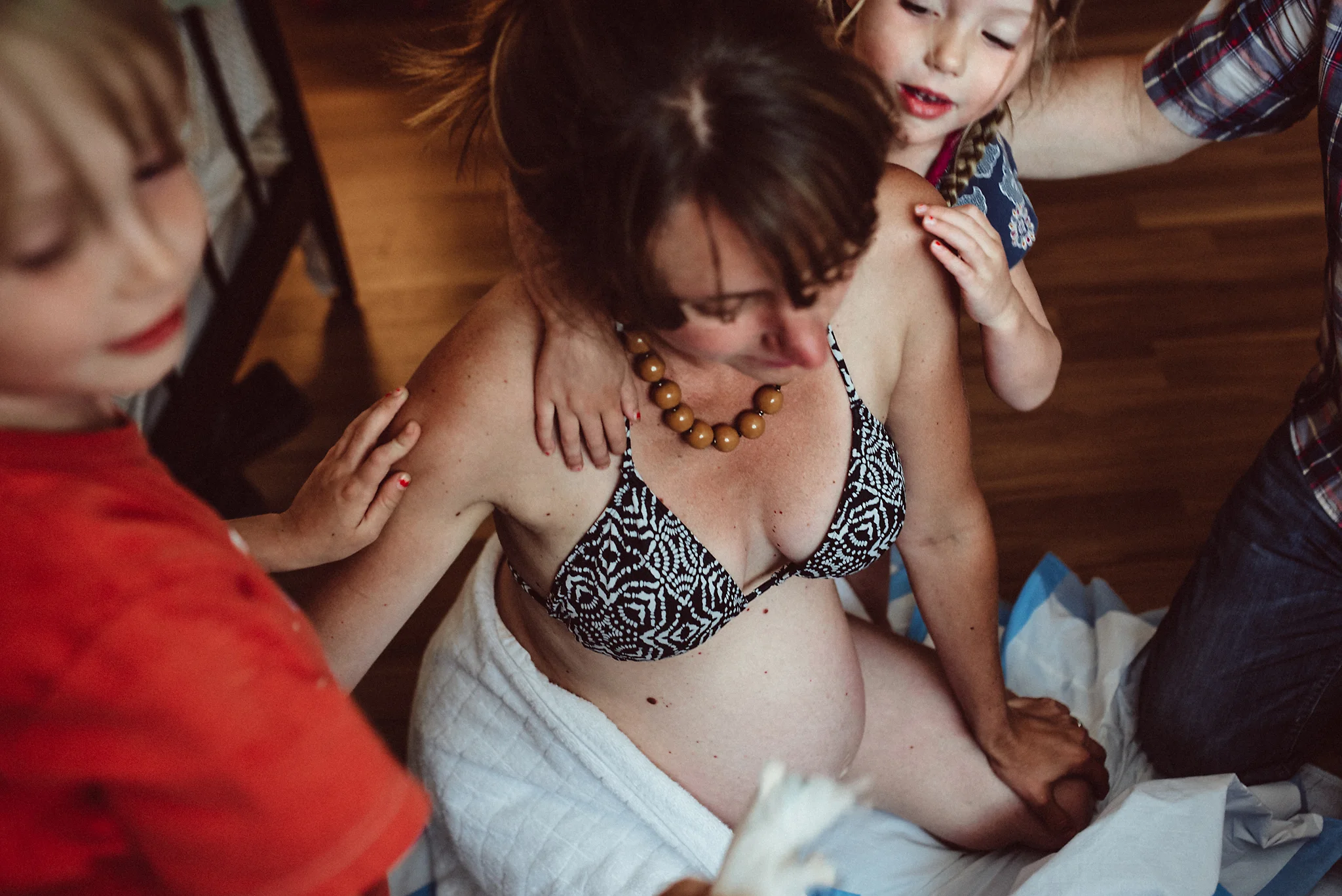 Kids support Mama during labor