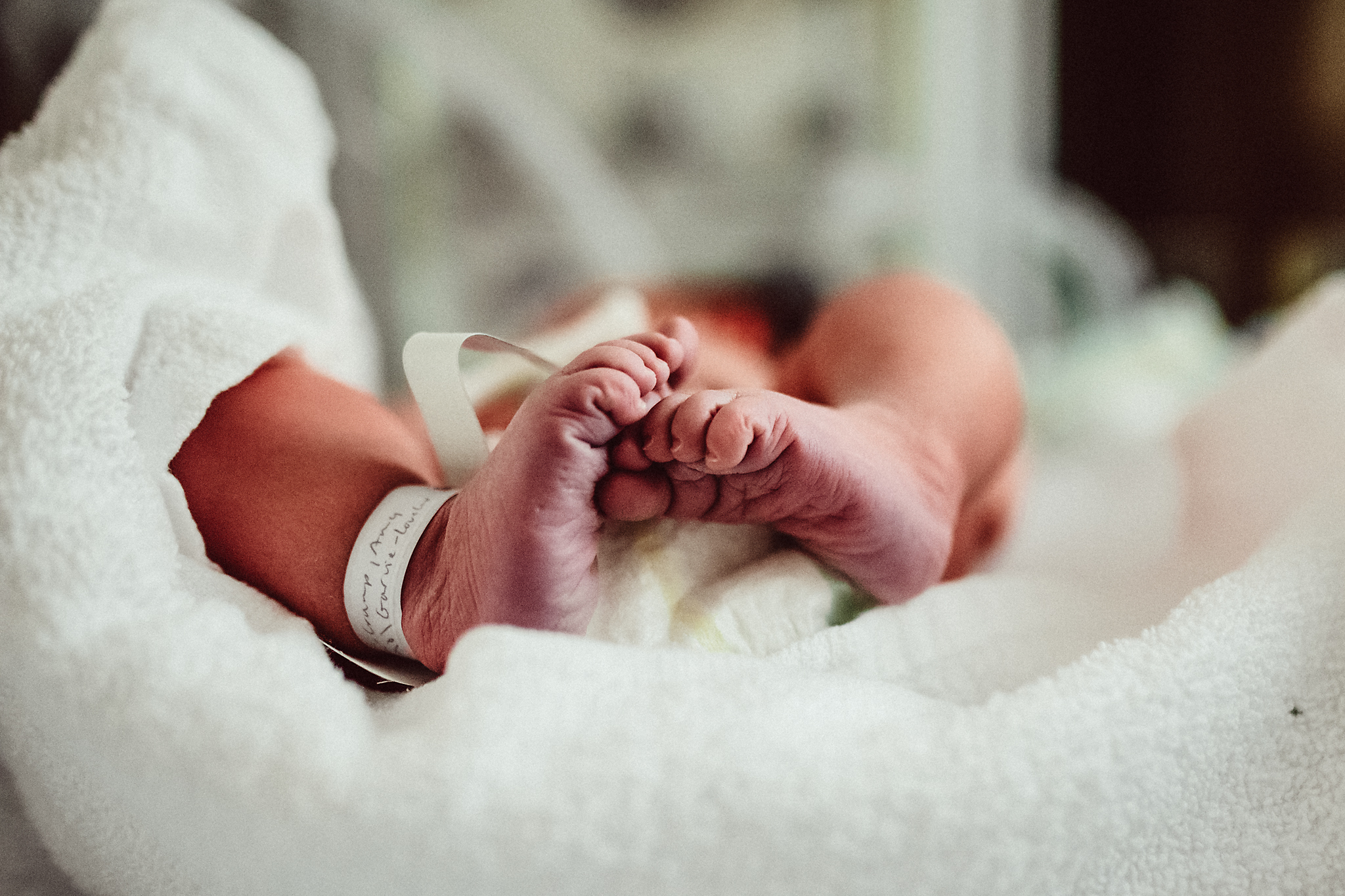 Newborn Toes in Hospital Warmer