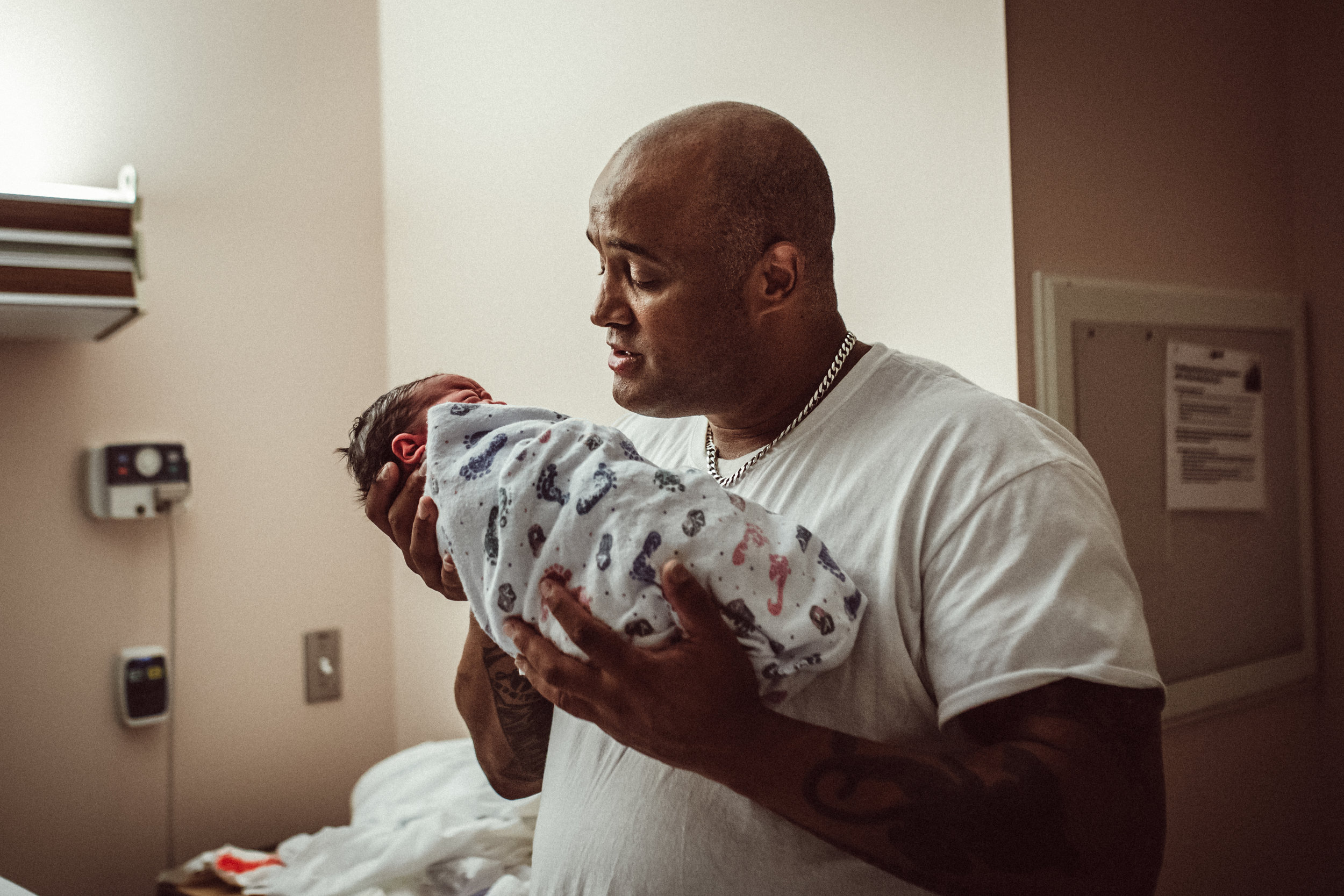 Dad holds baby in hospital Providence