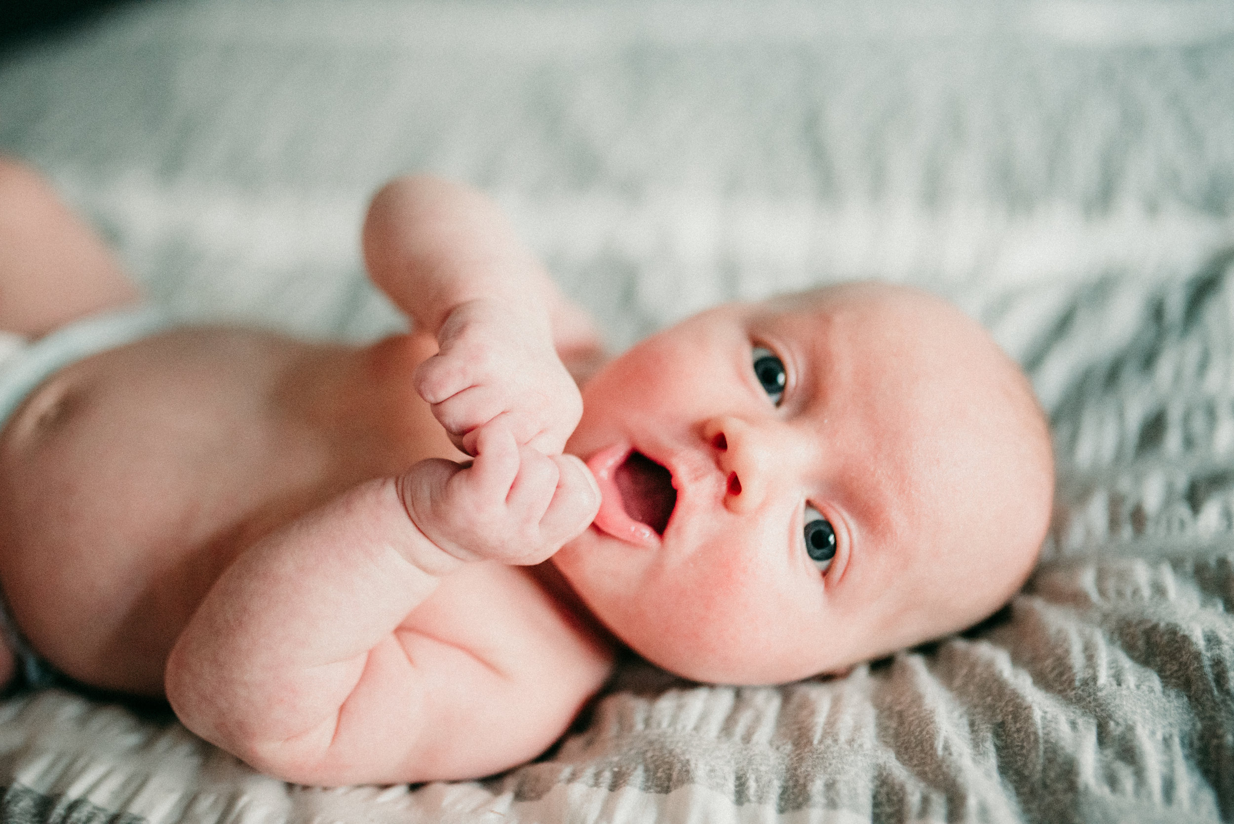 Newborn Baby on bed