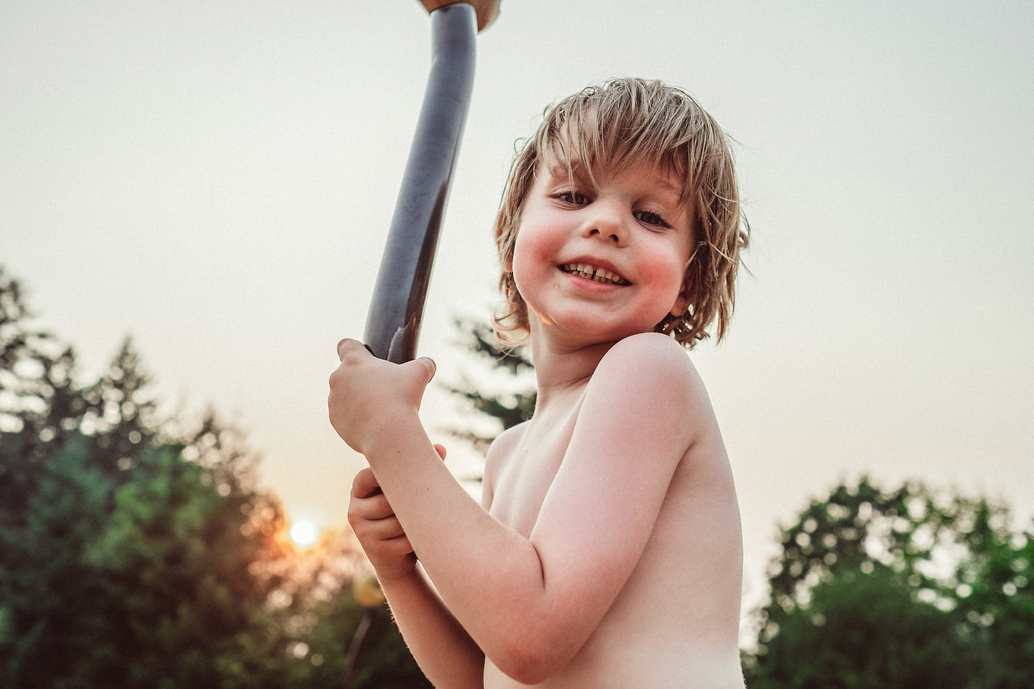 Boy at park at sunset in Portland, Oregon