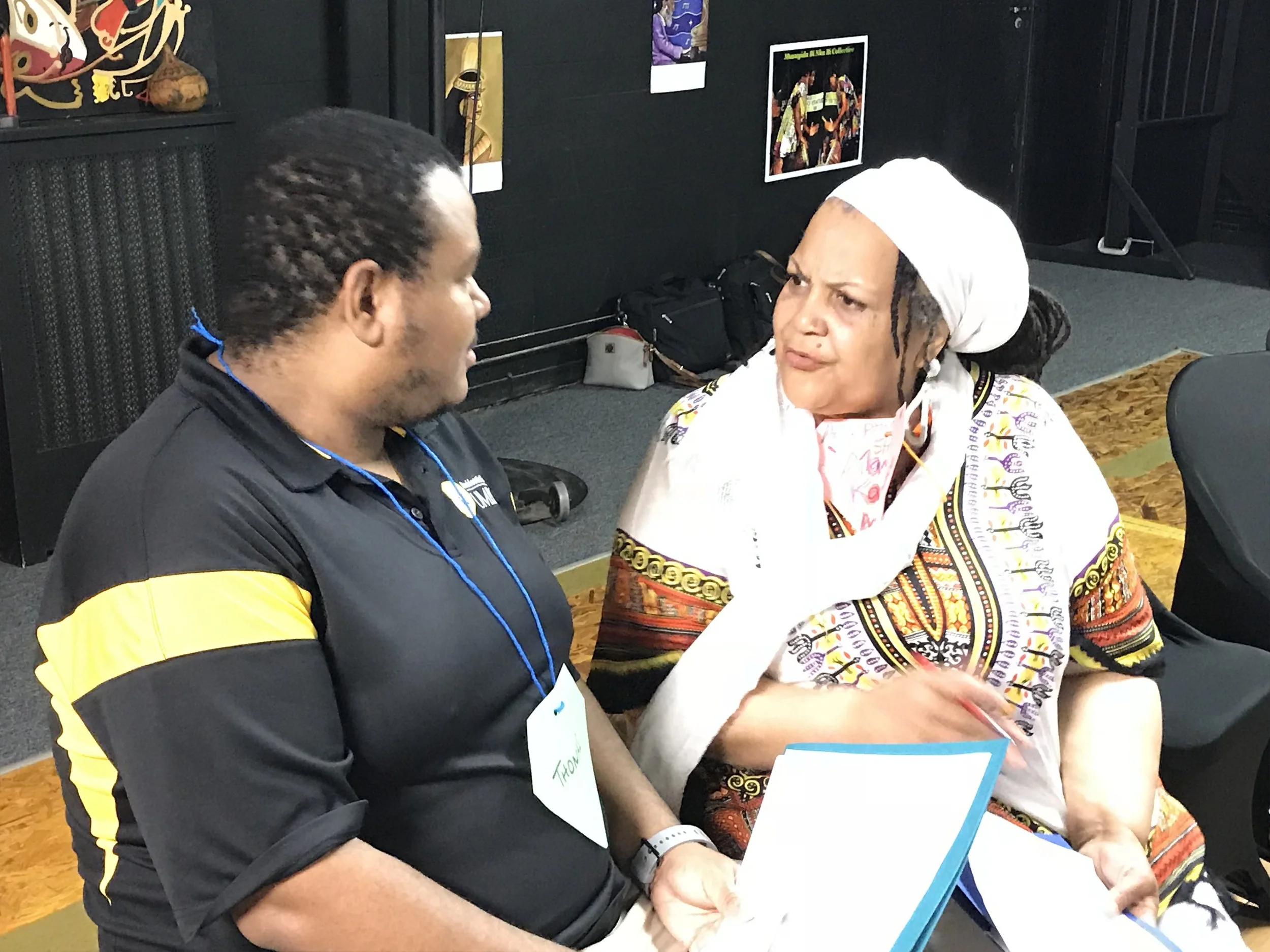 Mama Kay talking with a possible long-lost relative