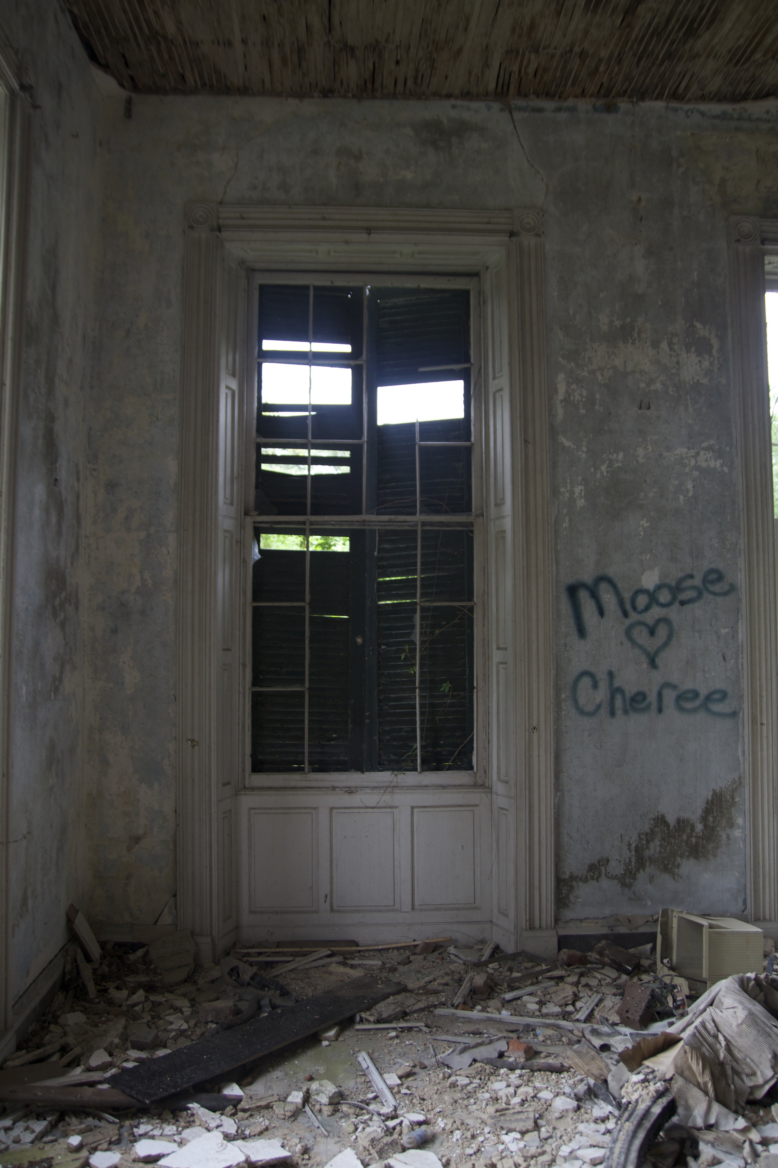 One of the 4 large rooms on the first floor-likely the library or sitting parlor.
