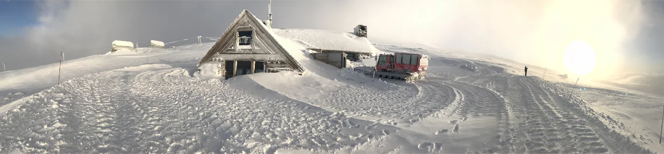  A panoramic picture of the Silcox Hut, complete with transportation out front. Image Courtesy: Dan Meyers 