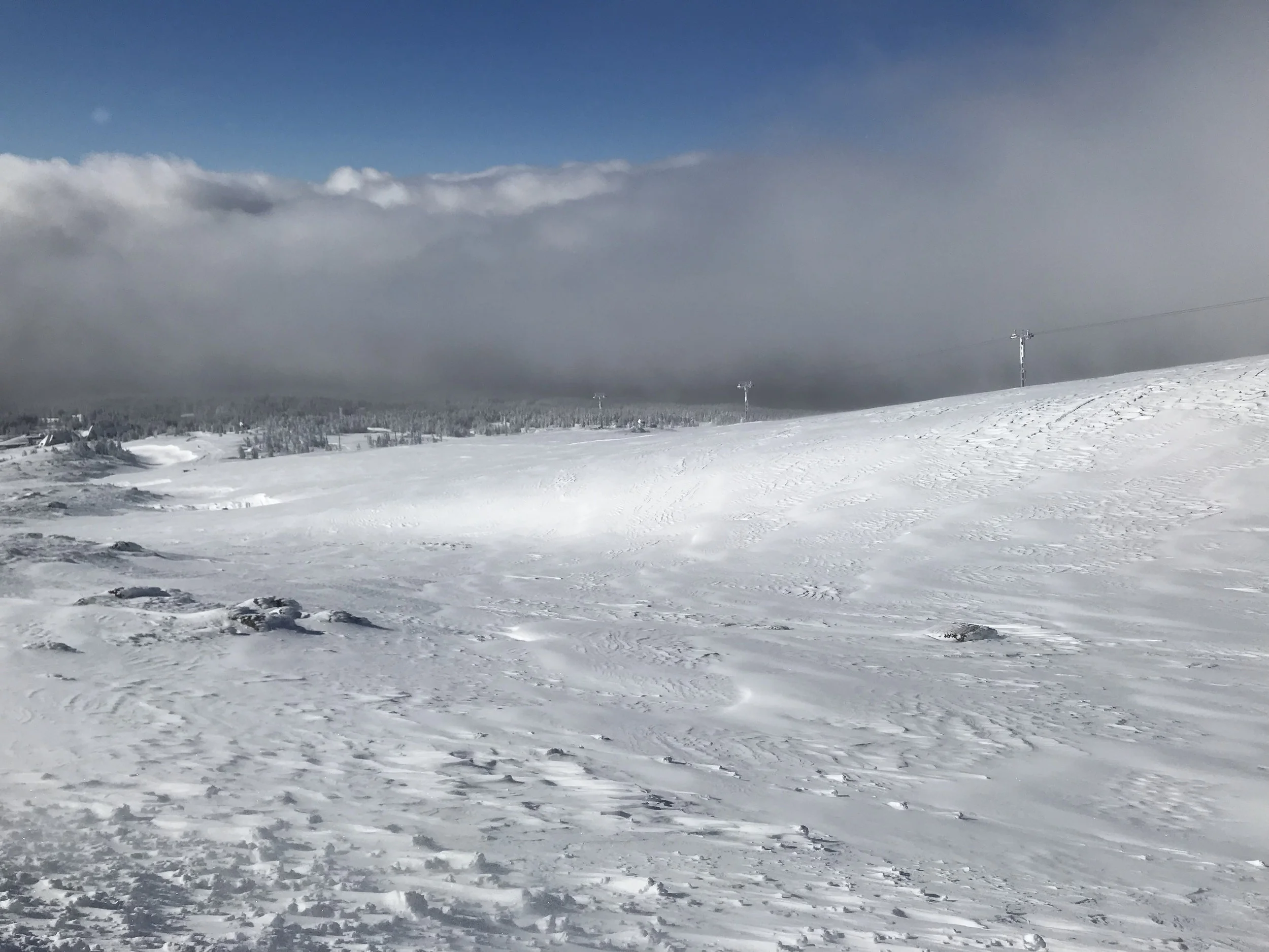 Another look down the mountain from the "front porch" of the Silcox...this time the sun has come up a bit more and we were getting ready to depart on skis and boards. You can see Timberline Lodge down in the distance. Image Courtesy: Dan Meyers