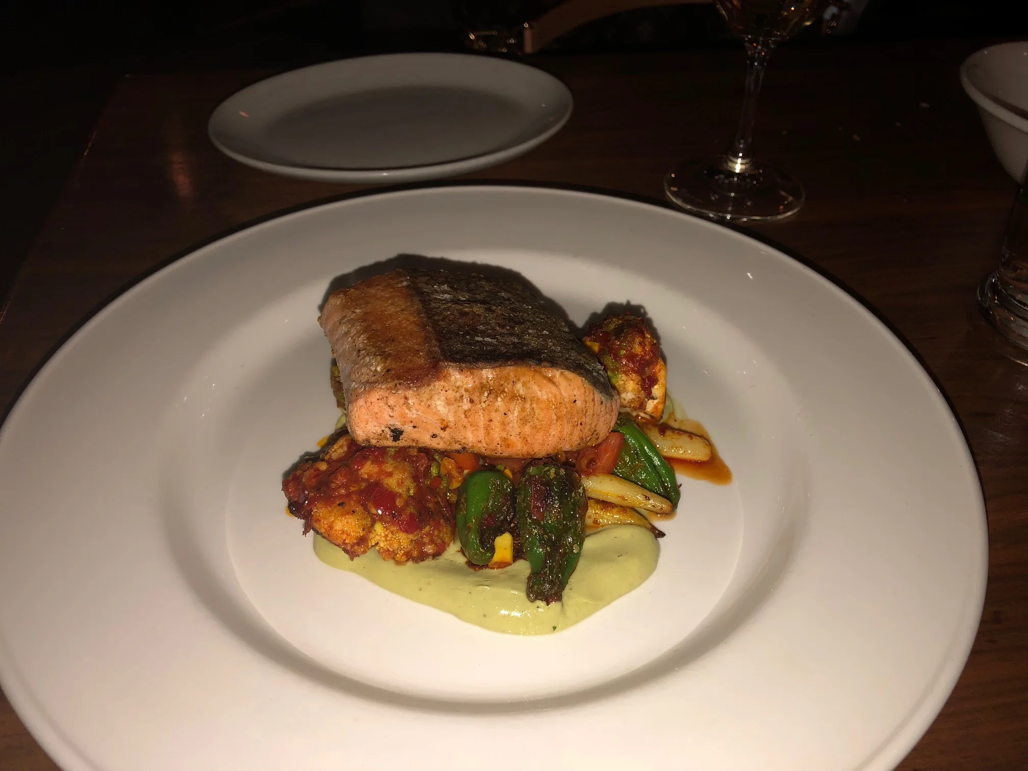  Here’s a pic of my wife’s order…the Wild King Salmon a la Plancha with harissa, summer succotash, creamy poblano puree. Yum! Image Credit: Dan Meyers 