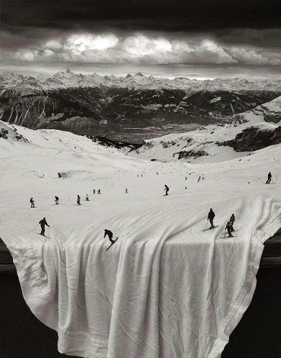 I just love this illusion. A big, photo mural, table with white table cloth, and I’m suspected some Photoshop work on the skiers. Too fun! Image Courtesy: mightyopticalillusions.com