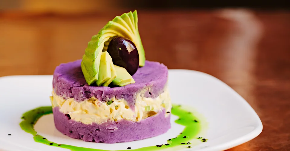  Another one of my very favorite tapas at Andina, the Morada. This dish is described on the menu as: MORADA Peruvian purple potato with shredded chicken breast with ají amarillo purée 10.5 - Image Courtesy: Andina.com 
